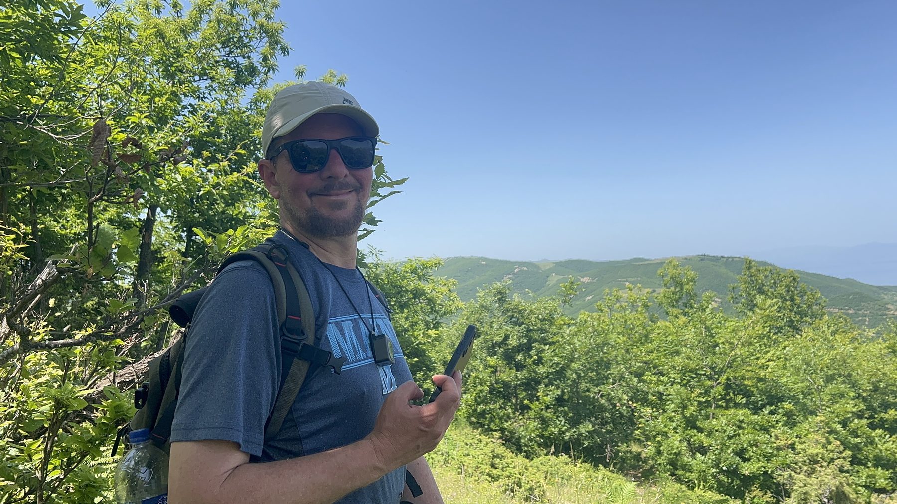 A hiker at the mountain-top clearing on the Kabash Trail, where we flew the drone